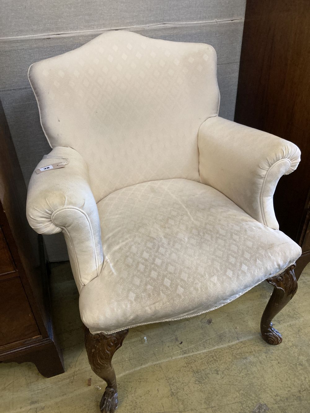 A George I style upholstered armchair, width 74cm, height 92cm
